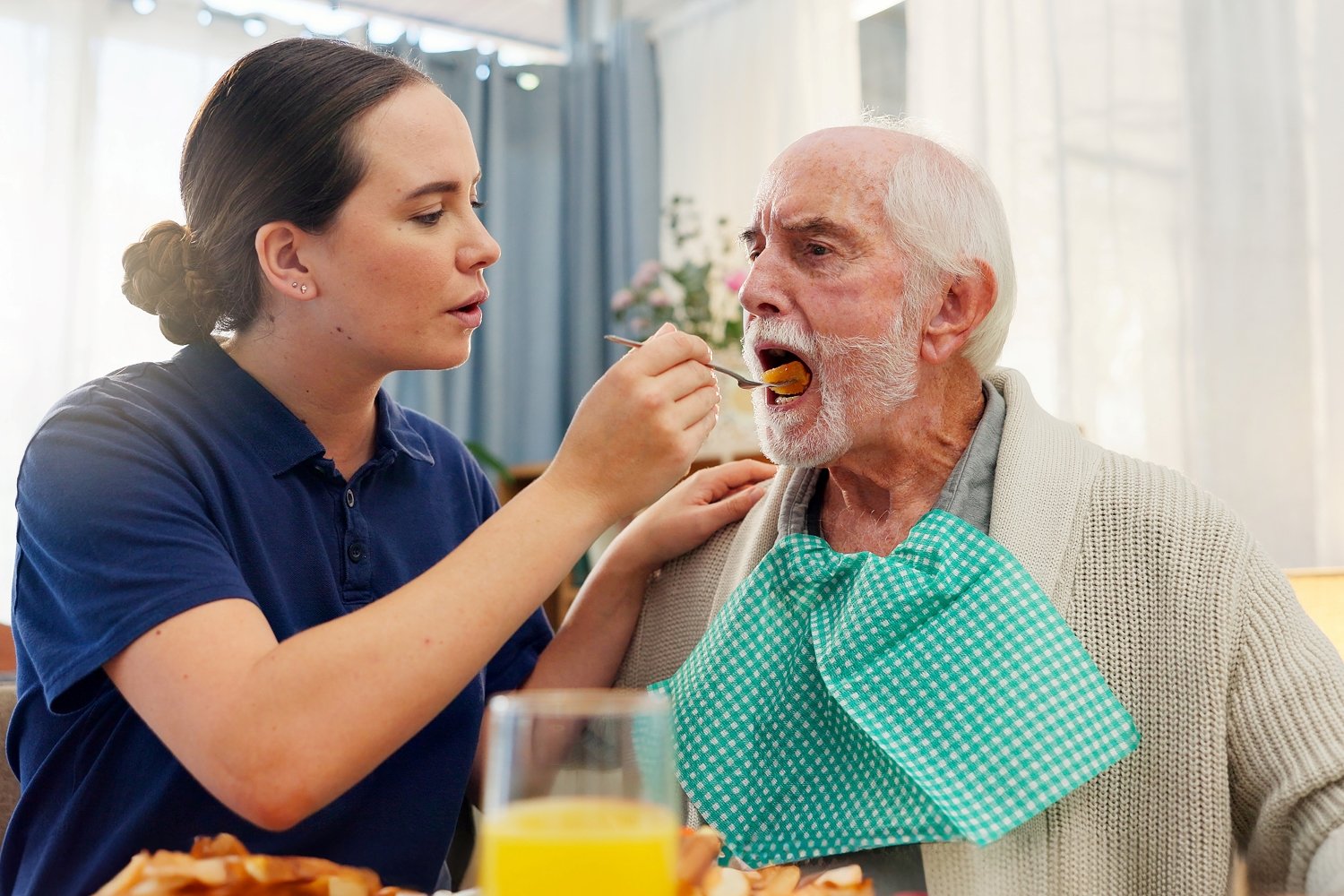Caregiver helping senior